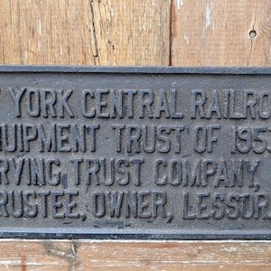 New York Central Railroad equipment trust of 1953 cast Iron sign. Rare !