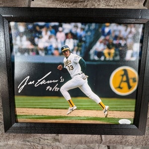 Autographed Jose Canseco Oakland Athletics 8x10 inch framed photo with certificate of authenticity from JSA