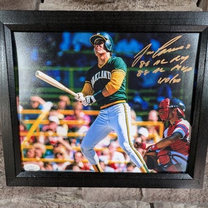 Autographed Jose Canseco Oakland Athletics 8x10 inch framed photo with certificate of authenticity from JSA