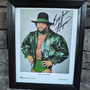 Autographed Billy Jack Haynes 8x10 inch framed photo with certificate of authenticity from JSA