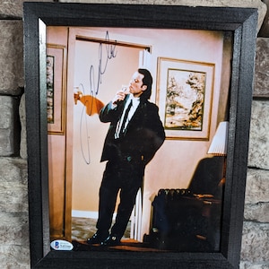 Autographed John Travolta Vincent Vega Pulp Fiction 8x10 inch framed photo with certificate of authenticity from PSA