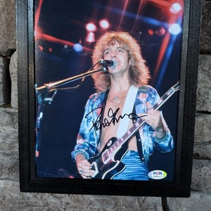 Autographed Peter Frampton 8x10 inch framed photo with certificate of authenticity from PSA