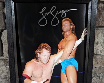 Autographed WWF WWE Lex Luger 8x10 inch framed photo with certificate of authenticity from JSA