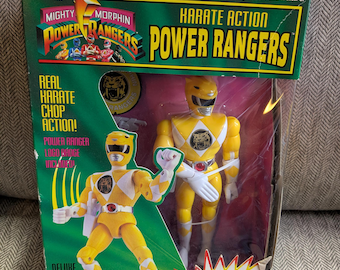 Vintage 1994 Bandai 8 inch Mighty Morphin Power Rangers Karate Action Power Rangers Action figure in original box. Trini Yellow Ranger