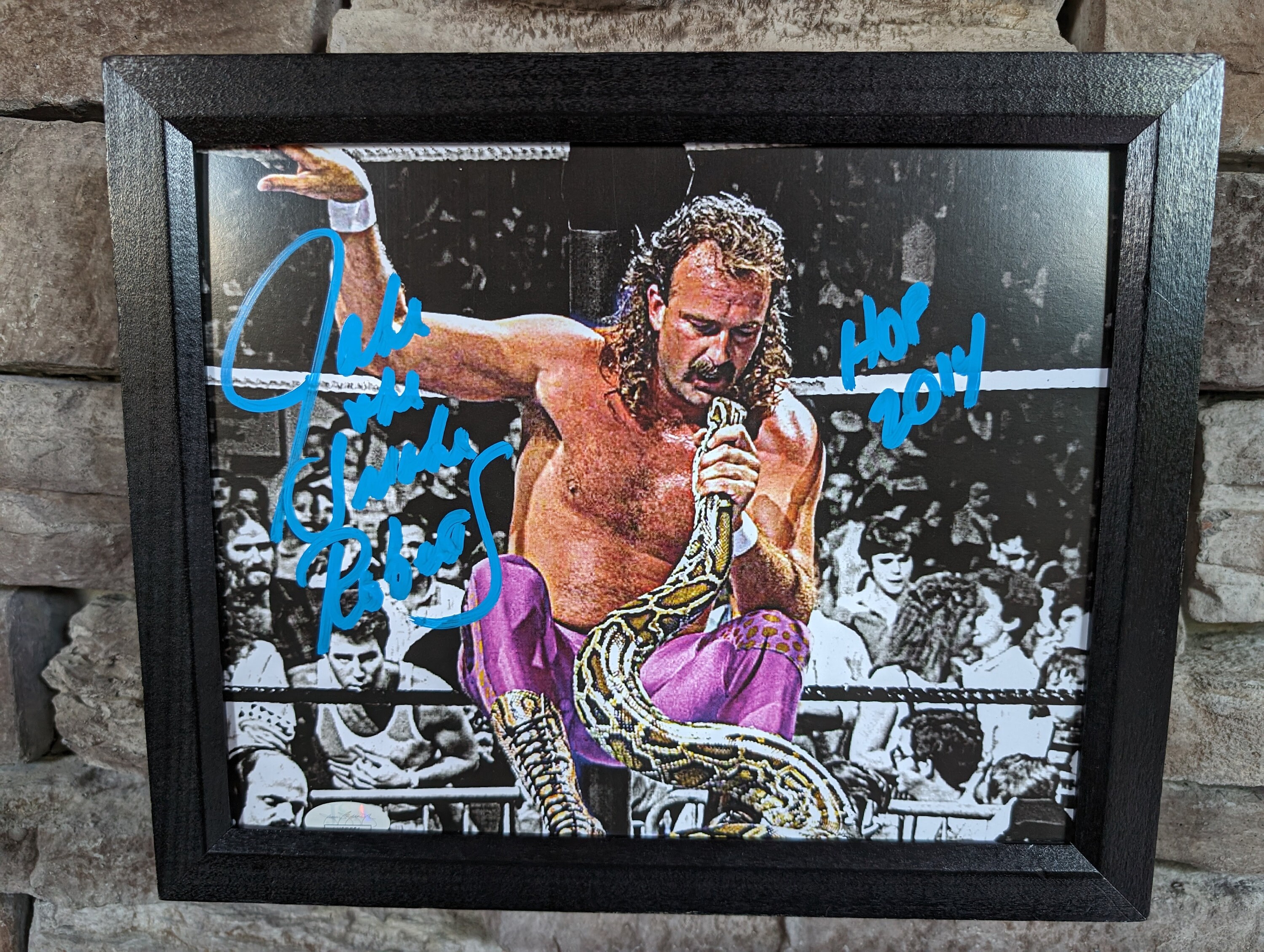 Autographed Jake The Snake Roberts 8x10 inch framed photo with certificate of authenticity from JSA