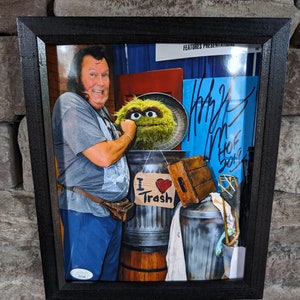 Autographed The Honky Tonk Man WWF rare photo with Oscar the Grouch 8x10 inch photo with certificate of authenticity from JSA