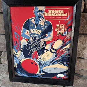 May include: Framed Sports Illustrated cover with a bowling theme. The image shows a bowler in action, with a red bowling ball hitting pins. The cover includes the text "Sports Illustrated" and "Where Are They Now?"