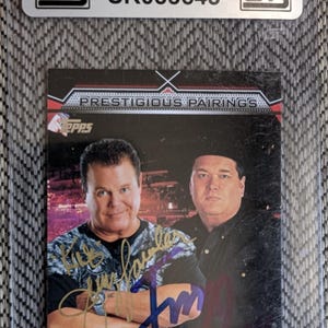 Autographed Topps Prestigious pairings WWF WWE The King Jerry Lawler and Jim Ross trading card certified authentic by CAS