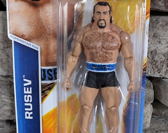 Vintage Mattel Toys  WWF WWE Rusev wrestling figure First Time in The Series ln original box never opened.