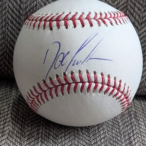 Autographed Dwight Doc Gooden NY Mets 1986 World series Champions Baseball with certificate of authenticity from JSA
