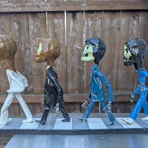 Arte popular mexicano Día de los muertos Esqueletos de papel maché Los Beatles Abbey Road