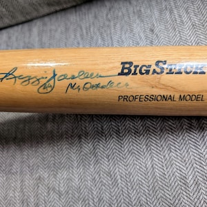 Autographed Reggie Jackson Mr. October inscription Baseball Bat Yankees Angels Athletica Orioles with certificate of authenticity from PSA