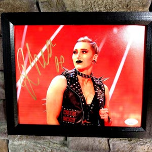 Autographed Rhea Ripley WWE WWF Wrestler 8x10 inch framed photo with certificate of authenticity from JSA