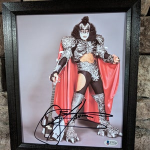 Autographed Gene Simmons Lead singer of Kiss 8x10 inch framed photo with certificate of authenticity from Beckett