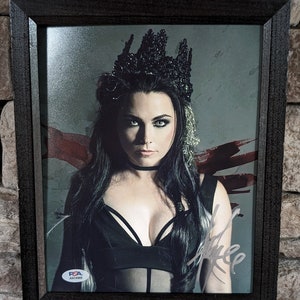 Autographed Amy Lee Evanescence lead singer. 8x10 inch framed photo with certificate of authenticity from PSA