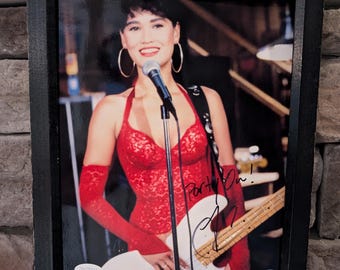 cassandra wayne's world red dress Tia Carrere, 50, sizzles in red dress at 25-year anniversary celebration  for Wayne's World