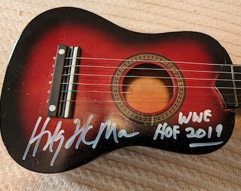 Autographed The Honky Tonk Man WWF Legend childs toy guitar with certificate of authenticity from JSA
