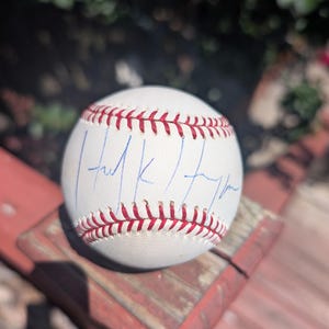 Autographed Hulk Hogan Baseball with certificate of authenticity from JSA