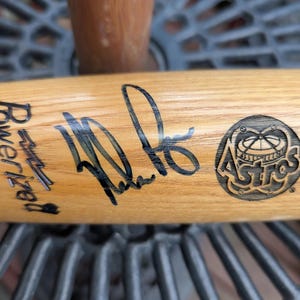 Autographed Nolan Ryan Houston Astros 5th Career No Hitter Commemorative Baseball Bat With certificate of authenticity from JSA.