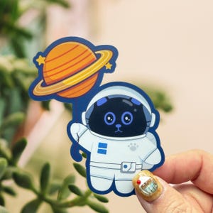 Sticker chat astronaute - Adorable chaton de l'espace avec ballon Saturne - Sticker chat noir en vinyle pour bouteille d'eau / ordinateur portable