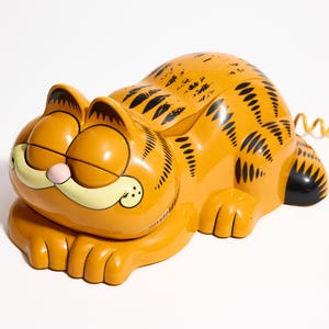 Volledig functionele Garfield-telefoon ~ Vintage Cat Novelty-telefoon uit de jaren 80 met bewegende ogen en zelfvoldane grijns ~ oranje en zwart ~ Jim Davis Comic