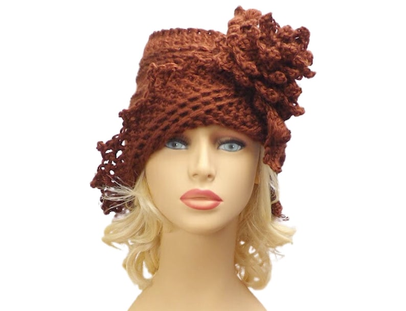 a crocheted hat on a mannequin head