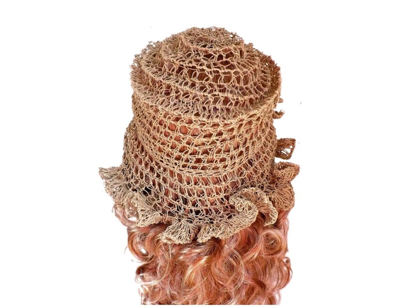 a mannequin head wearing a natural hemp twine hat with a diagonal ruffle