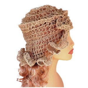 a mannequin head wearing a natural hemp twine hat with a diagonal ruffle