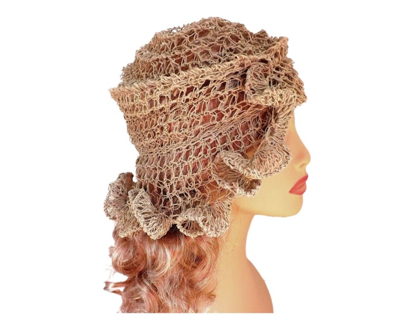 a mannequin head wearing a natural hemp twine hat with a diagonal ruffle