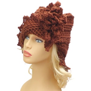 a crocheted hat on a mannequin head