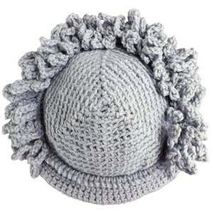 a crocheted hat with a flower on top of it