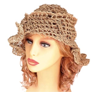 a mannequin head wearing a natural hemp twine hat with a diagonal ruffle