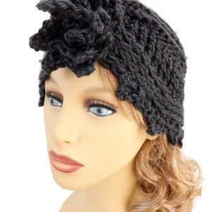 a mannequin head wearing a black knitted hat