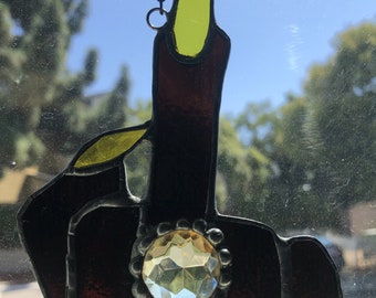 The Middle Finger in Stained Glass, Brown glass with Yellow Finger Nails and Yellow 20mm faceted Jewel, 5.5 high x 3.75 inches, Sun Catcher