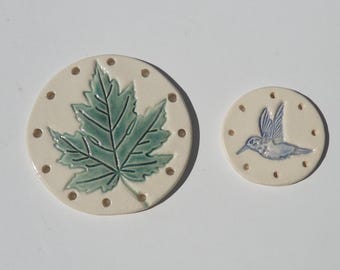 Set of Two. Ceramic base for pine needle baskets, Hand Built Hand Painted maple leaf and hummingbird