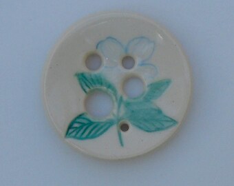 Ceramic Diz. This ceramic Diz was handmade and hand painted Dogwood by me using food safe glaze