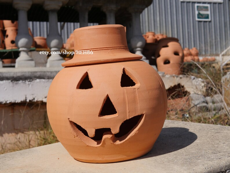 3 Gallon Terra Cotta Jacko'lantern Pumpkin with Hat from Etsy