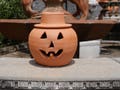 1 Gallon Terra Cotta Jack-o'-lantern Pumpkin with Hat from Craven Pottery
