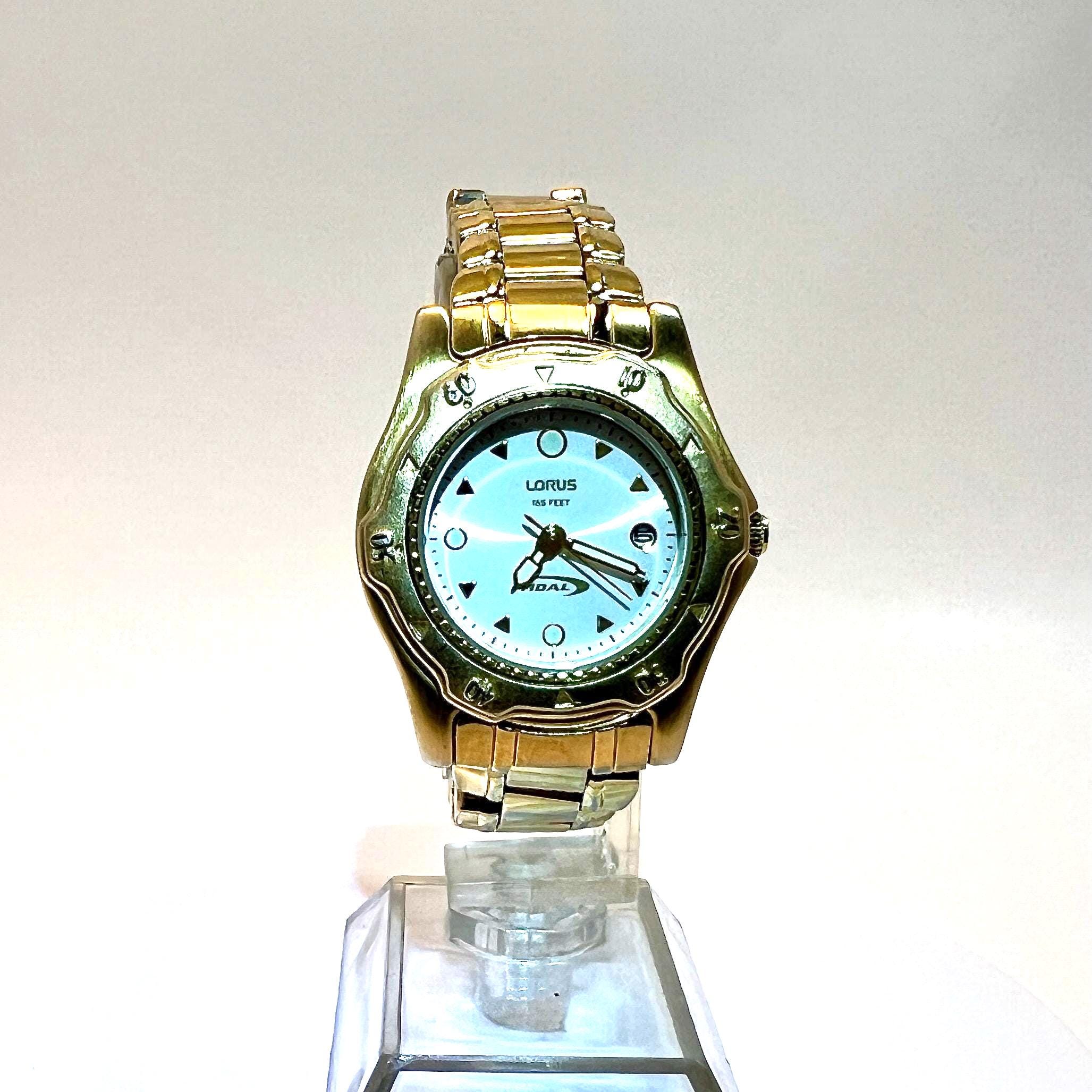 Vintage Lorus Tidal Women's Gold Tone Diver's Watch with Date