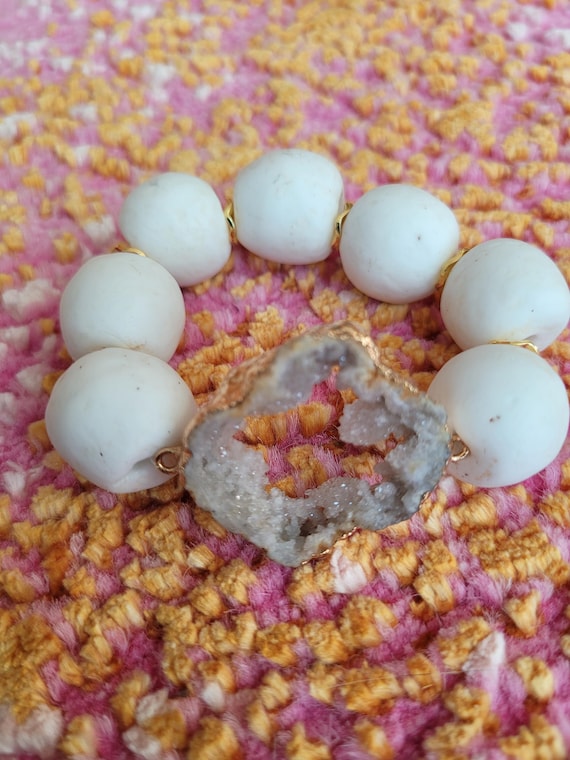 Energetically HEALING white sand cast beads complimenting  gold plated druzy quartz focal piece stretch, stacking bracelet.