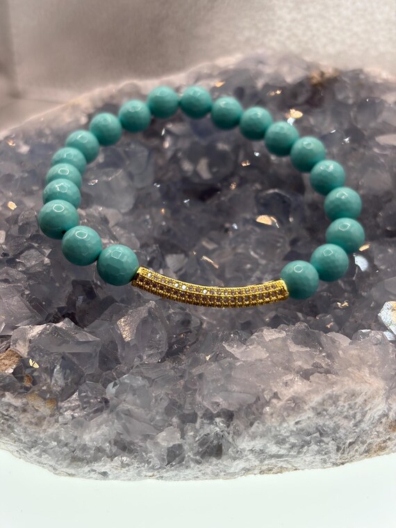 Energetically SOOTHING baby blue faceted mother of pearl beads with cubic zirconia pave gold plated noodle focal bead stretch bracelet
