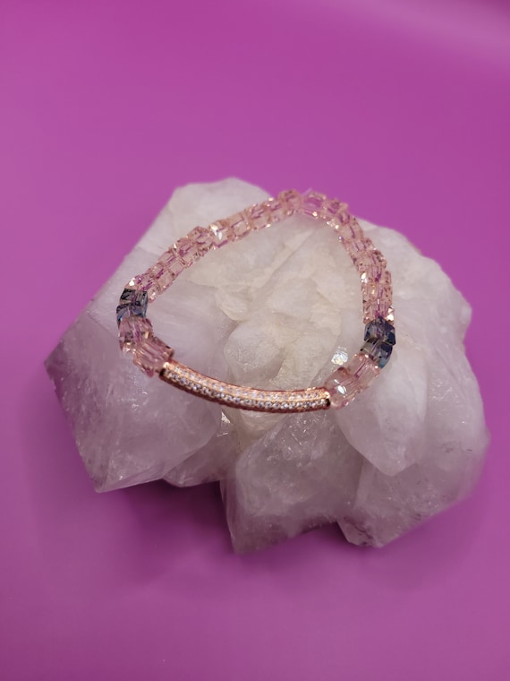 Energetically WARMING pink crystal cube beads with 14k rose gold rhinestone noodle centerpiece bead bracelet.
