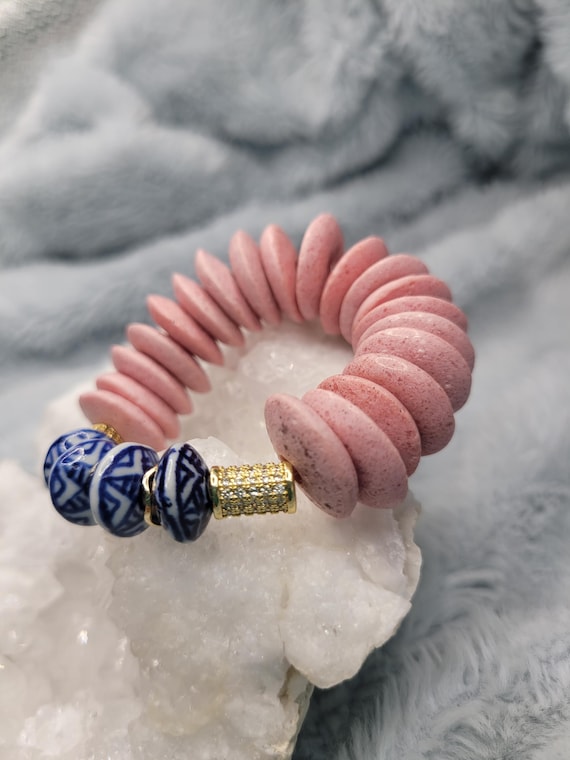 Energetically INSPIRING chinoserie boho saucer beads paired with pink sandcast saucer beads stretch, stacking bracelet.