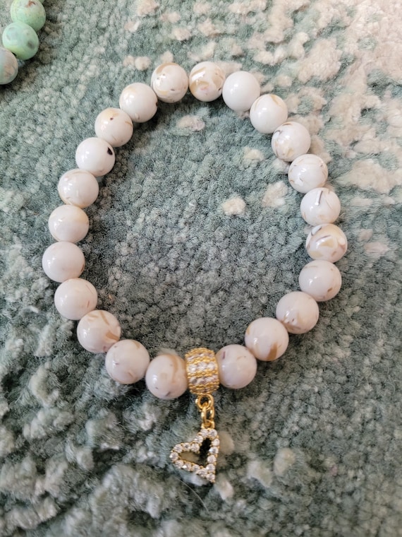 Energetically PURIFYING white shell turquoise beads with cz paved spacer bead and heart charm stretch stacking bracelet