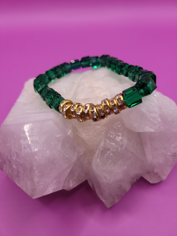 Energetically UPLIFTING czech rhinestone gold centerpiece beads and emerald green crystal cube beads bracelet.