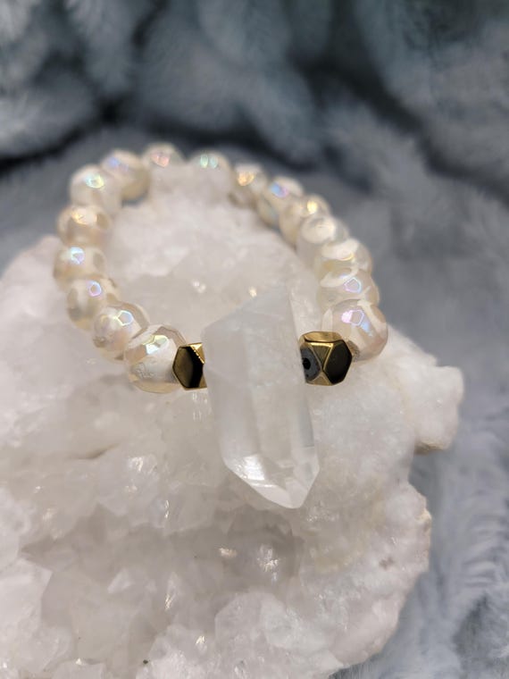 Energetically IGNITING faceted striped agate beads paired with quartz point stretch, stacking bracelet