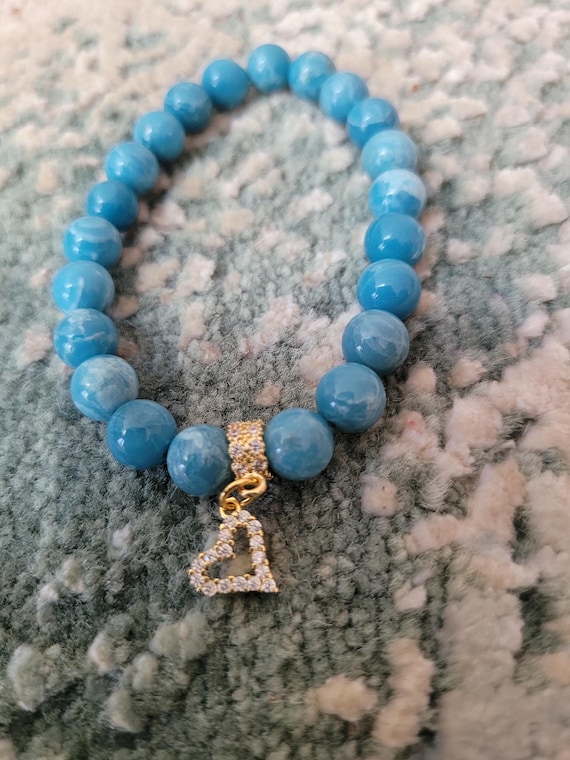 Energetically CALMING larimar beads complimenting cz paved gold plated heart charm and bead stretch, stacking bracelet.