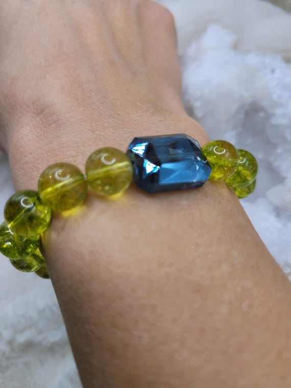 Energetically DETOXIFYING peridot and faceted blue rectangle crystal focal bead stretch stacking bracelet
