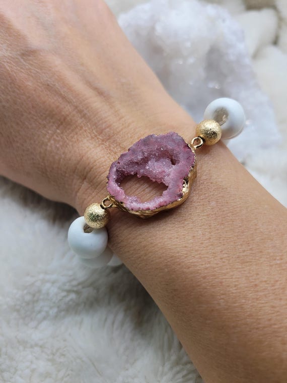 Energetically ELEVATING druzy quartz focal slab bead adorned with white sandcast beads from W Africa.