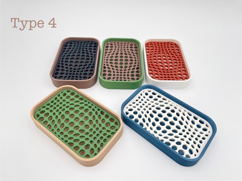 May include: Rectangular soap dishes in various colors, including navy, brown, green, red, and blue. Each dish features a unique, textured pattern with a perforated design. The text "Type 4" is in the upper left corner.